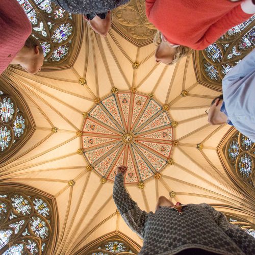 Image of people looking at the ceiling of a cathedral