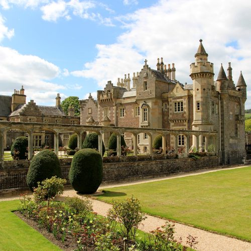 Image of a stately house and gardens